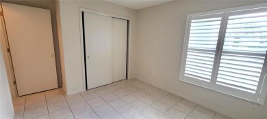 NO BOND. 2/2 Block  Stucco Courtyard Villa in the Village of on Glenview Championship Golf and Country Club in Florida - for sale on GolfHomes.com, golf home, golf lot