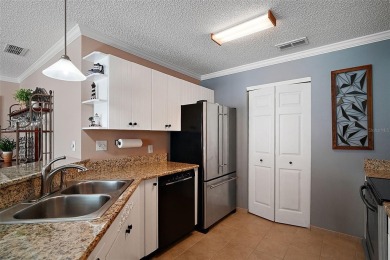 METICULOUSLY-MAINTAINED, TURNKEY 2/2 Cabot Cove Patio Villa with on El Diablo Executive Golf Course in Florida - for sale on GolfHomes.com, golf home, golf lot