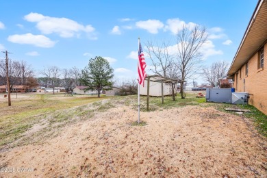 Welcome to 129 Virginia Dr. Step into this beautiful 4-bedroom on WynRidge Greens in Tennessee - for sale on GolfHomes.com, golf home, golf lot