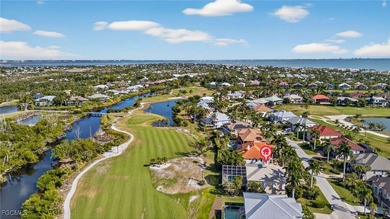 This elevated island residence offers refined tropical living in on Beachview Golf Club in Florida - for sale on GolfHomes.com, golf home, golf lot