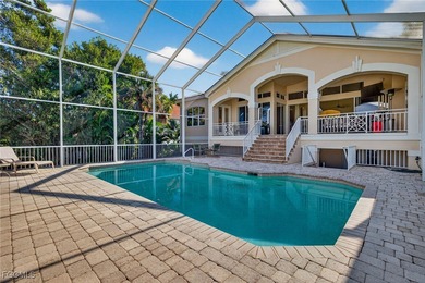 This elevated island residence offers refined tropical living in on Beachview Golf Club in Florida - for sale on GolfHomes.com, golf home, golf lot
