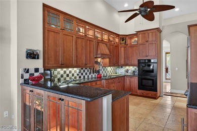 This elevated island residence offers refined tropical living in on Beachview Golf Club in Florida - for sale on GolfHomes.com, golf home, golf lot