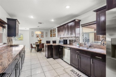 Two Houses for the Price of One! Welcome to this rare on Babe Zaharias Golf Course in Florida - for sale on GolfHomes.com, golf home, golf lot