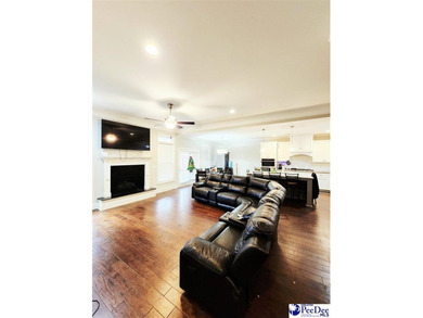 Welcome to 309 Dormie Lane, a luxury residence located behind on The Members Club At Woodcreek in South Carolina - for sale on GolfHomes.com, golf home, golf lot