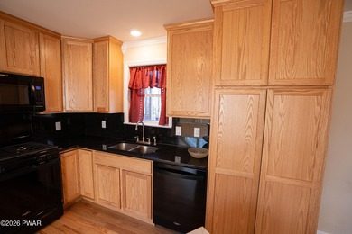 Enjoy easy one-level living in this next-to-new contemporary on The Hideout Golf in Pennsylvania - for sale on GolfHomes.com, golf home, golf lot