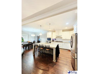 Welcome to 309 Dormie Lane, a luxury residence located behind on The Members Club At Woodcreek in South Carolina - for sale on GolfHomes.com, golf home, golf lot