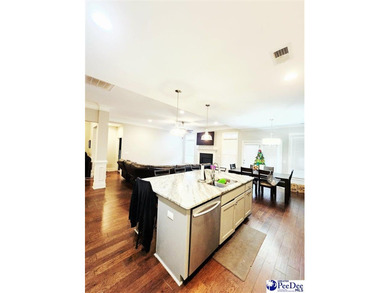 Welcome to 309 Dormie Lane, a luxury residence located behind on The Members Club At Woodcreek in South Carolina - for sale on GolfHomes.com, golf home, golf lot