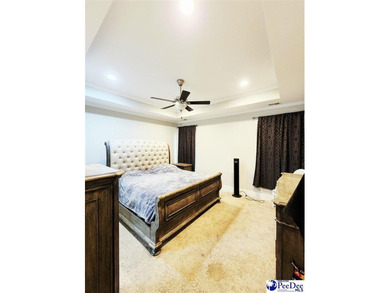 Welcome to 309 Dormie Lane, a luxury residence located behind on The Members Club At Woodcreek in South Carolina - for sale on GolfHomes.com, golf home, golf lot