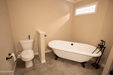 Enjoy easy one-level living in this next-to-new contemporary on The Hideout Golf in Pennsylvania - for sale on GolfHomes.com, golf home, golf lot