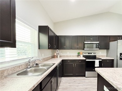 One or more photo(s) has been virtually staged. Backs open space on Marion Oaks Country Club in Florida - for sale on GolfHomes.com, golf home, golf lot