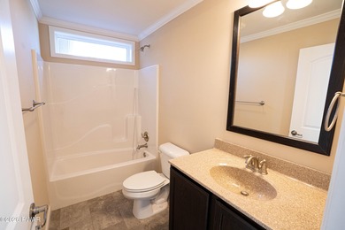 Enjoy easy one-level living in this next-to-new contemporary on The Hideout Golf in Pennsylvania - for sale on GolfHomes.com, golf home, golf lot