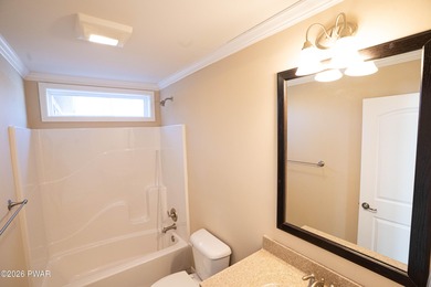 Enjoy easy one-level living in this next-to-new contemporary on The Hideout Golf in Pennsylvania - for sale on GolfHomes.com, golf home, golf lot