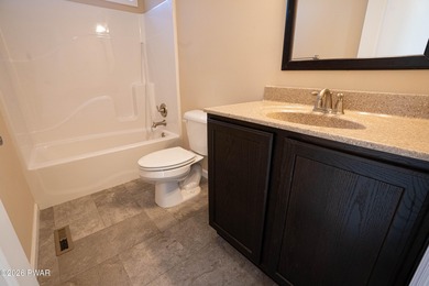 Enjoy easy one-level living in this next-to-new contemporary on The Hideout Golf in Pennsylvania - for sale on GolfHomes.com, golf home, golf lot