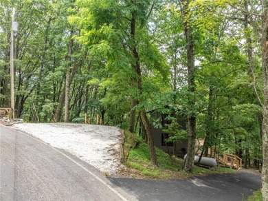 Welcome home to Cutthroat Ridge! Perched on a crest here you on Bent Tree Golf Course in Georgia - for sale on GolfHomes.com, golf home, golf lot