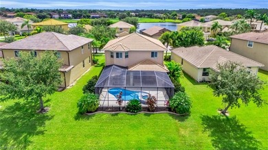 Thoughtfully positioned to capture sunsets over the lake, this on Valencia Golf and Country Club in Florida - for sale on GolfHomes.com, golf home, golf lot