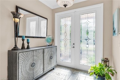 Thoughtfully positioned to capture sunsets over the lake, this on Valencia Golf and Country Club in Florida - for sale on GolfHomes.com, golf home, golf lot