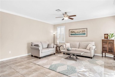 Thoughtfully positioned to capture sunsets over the lake, this on Valencia Golf and Country Club in Florida - for sale on GolfHomes.com, golf home, golf lot