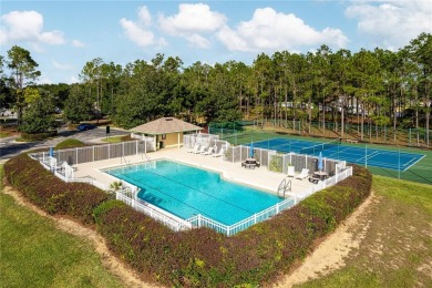 Discover this stunning 5-bedroom, 3-bathroom, 2-story home on Highlands Reserve Golf Club in Florida - for sale on GolfHomes.com, golf home, golf lot