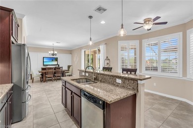 Thoughtfully positioned to capture sunsets over the lake, this on Valencia Golf and Country Club in Florida - for sale on GolfHomes.com, golf home, golf lot