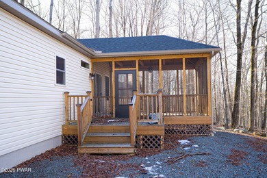 Enjoy easy one-level living in this next-to-new contemporary on The Hideout Golf in Pennsylvania - for sale on GolfHomes.com, golf home, golf lot