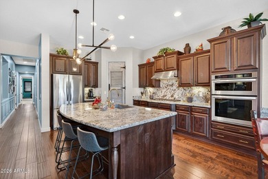 Experience elevated living in the heart of Litchfield Park on Wigwam Golf  Resort Litchfield Park  in Arizona - for sale on GolfHomes.com, golf home, golf lot