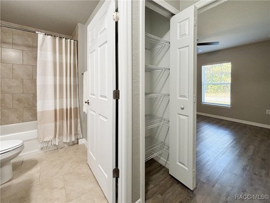 One or more photo(s) has been virtually staged. Backs open space on Marion Oaks Country Club in Florida - for sale on GolfHomes.com, golf home, golf lot