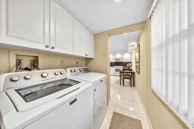 Spacious and updated 3BR/2.5BA *F* model with tile & laminate on  in Florida - for sale on GolfHomes.com, golf home, golf lot