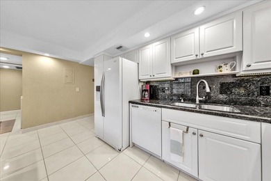 Spacious and updated 3BR/2.5BA *F* model with tile & laminate on  in Florida - for sale on GolfHomes.com, golf home, golf lot