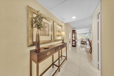 Spacious and updated 3BR/2.5BA *F* model with tile & laminate on  in Florida - for sale on GolfHomes.com, golf home, golf lot