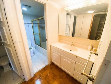 Experience the breathtaking views of a serene tropical golf on Turnberry Isle Resort and Club in Florida - for sale on GolfHomes.com, golf home, golf lot