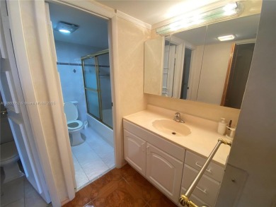 Experience the breathtaking views of a serene tropical golf on Turnberry Isle Resort and Club in Florida - for sale on GolfHomes.com, golf home, golf lot