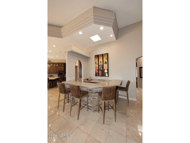 Experience luxury living in this beautifully renovated 5-bedroom on Ancala Country Club in Arizona - for sale on GolfHomes.com, golf home, golf lot
