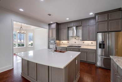 Welcome to this beautifully maintained Craftsman-style home on Harbor Club Golf and Country Club in Georgia - for sale on GolfHomes.com, golf home, golf lot