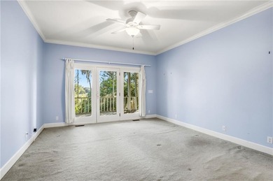 You will not want to miss the opportunity to own this 3-bedroom on Oak Grove Island Golf and Country Club in Georgia - for sale on GolfHomes.com, golf home, golf lot