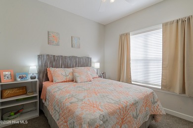 Welcome to this charming brick-front home tucked inside the on Brunswick Plantation and Golf Resorts in North Carolina - for sale on GolfHomes.com, golf home, golf lot