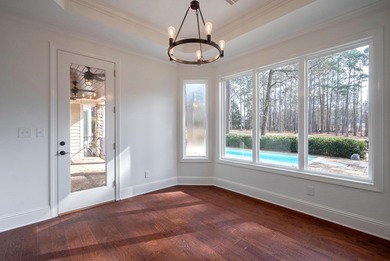 Welcome to this beautifully maintained Craftsman-style home on Harbor Club Golf and Country Club in Georgia - for sale on GolfHomes.com, golf home, golf lot