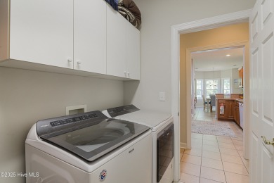 Welcome to this charming brick-front home tucked inside the on Brunswick Plantation and Golf Resorts in North Carolina - for sale on GolfHomes.com, golf home, golf lot
