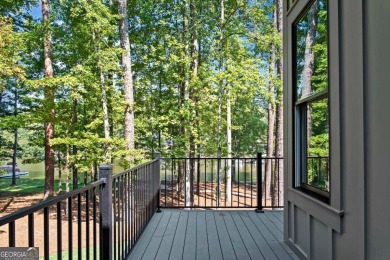 Stunning Lakefront Luxury Home in Reynolds Landing with Sunset on Reynolds Lake Oconee - The Landing in Georgia - for sale on GolfHomes.com, golf home, golf lot