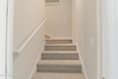 Welcome to this charming brick-front home tucked inside the on Brunswick Plantation and Golf Resorts in North Carolina - for sale on GolfHomes.com, golf home, golf lot