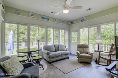 Welcome to this charming brick-front home tucked inside the on Brunswick Plantation and Golf Resorts in North Carolina - for sale on GolfHomes.com, golf home, golf lot