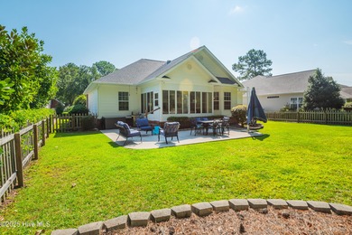 Welcome to this charming brick-front home tucked inside the on Brunswick Plantation and Golf Resorts in North Carolina - for sale on GolfHomes.com, golf home, golf lot