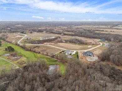 Unit #28 - PREMIUM 1-ACRE WALKOUT BASEMENT HOMESITE BACKING TO on The Myth Golf and Banquet - Beaver Creek Links in Michigan - for sale on GolfHomes.com, golf home, golf lot