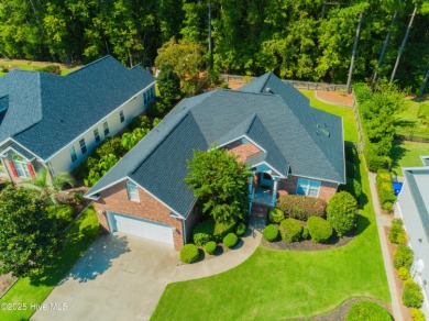 Welcome to this charming brick-front home tucked inside the on Brunswick Plantation and Golf Resorts in North Carolina - for sale on GolfHomes.com, golf home, golf lot