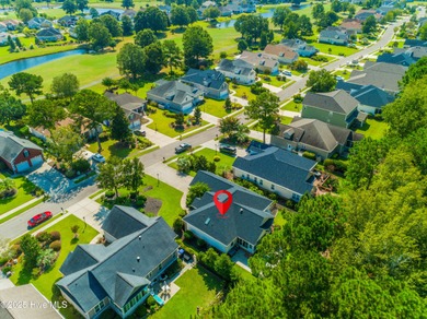 Welcome to this charming brick-front home tucked inside the on Brunswick Plantation and Golf Resorts in North Carolina - for sale on GolfHomes.com, golf home, golf lot