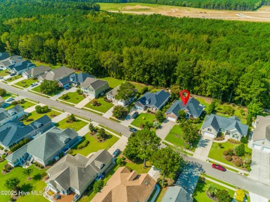 Welcome to this charming brick-front home tucked inside the on Brunswick Plantation and Golf Resorts in North Carolina - for sale on GolfHomes.com, golf home, golf lot