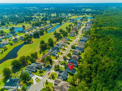 Welcome to this charming brick-front home tucked inside the on Brunswick Plantation and Golf Resorts in North Carolina - for sale on GolfHomes.com, golf home, golf lot