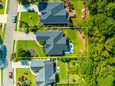 Welcome to this charming brick-front home tucked inside the on Brunswick Plantation and Golf Resorts in North Carolina - for sale on GolfHomes.com, golf home, golf lot