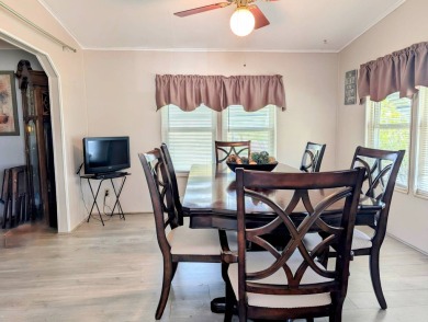 PICTURES SAY IT ALL! Uniquely designed 2 bedroom 2 bath on Grasslands Golf and Country Club in Florida - for sale on GolfHomes.com, golf home, golf lot