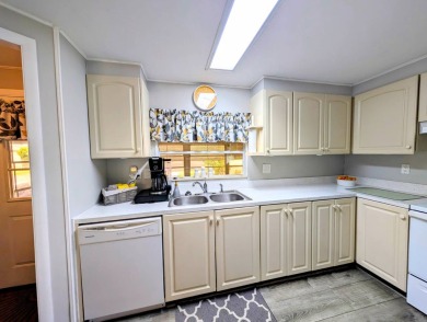 PICTURES SAY IT ALL! Uniquely designed 2 bedroom 2 bath on Grasslands Golf and Country Club in Florida - for sale on GolfHomes.com, golf home, golf lot