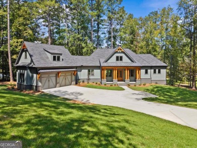 Stunning Lakefront Luxury Home in Reynolds Landing with Sunset on Reynolds Lake Oconee - The Landing in Georgia - for sale on GolfHomes.com, golf home, golf lot